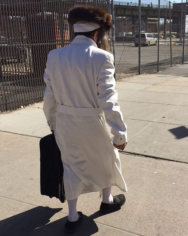 Purim is similar to Yom Kippur so some chassidim wear all white