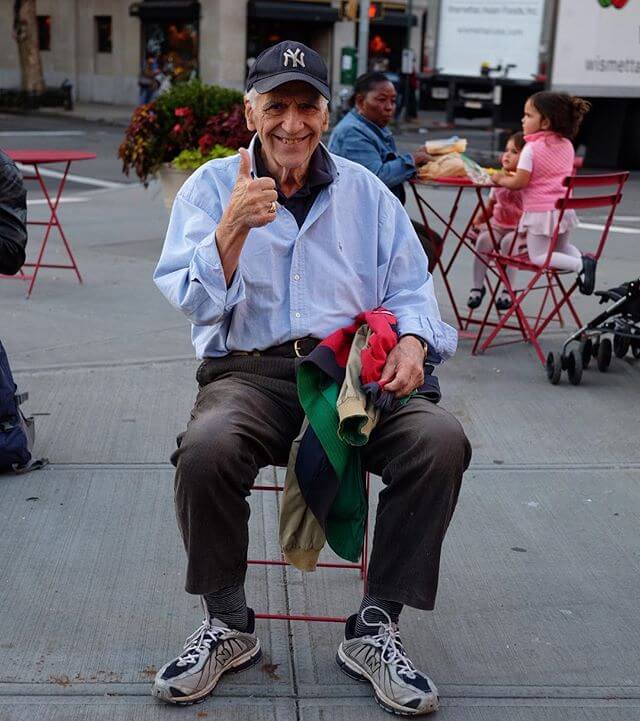 Popped collared polo under an oxford cloth button down (with some frumpiness but not shlumpy) tucked into striped trousers with walking sneakers. He said something about teaching (photography?) at NYU. Maybe someone can ID. @nyuniversity @nyuphotoj @tischphoto